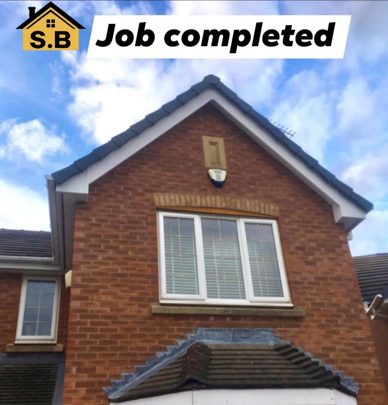 The bay window roof after re-tiling, below the gable