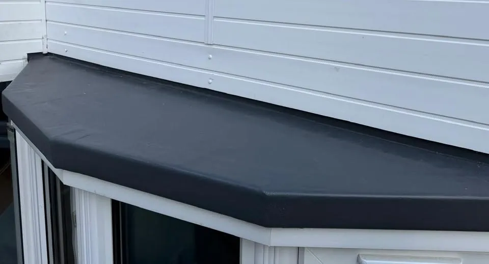 The new black GRP bay roof with neat edge trims