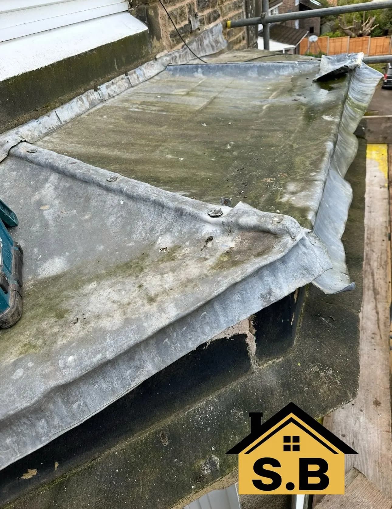 The old, worn lead on the bay before work started